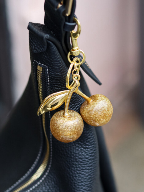 CHERRY BAG CHARM DARK GOLD GLITTER