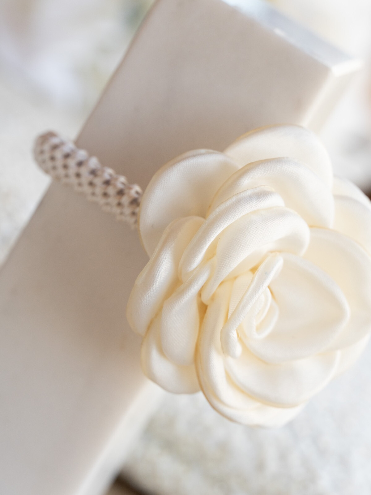 SATIN ROSE HAIR TIE OFF WHITE