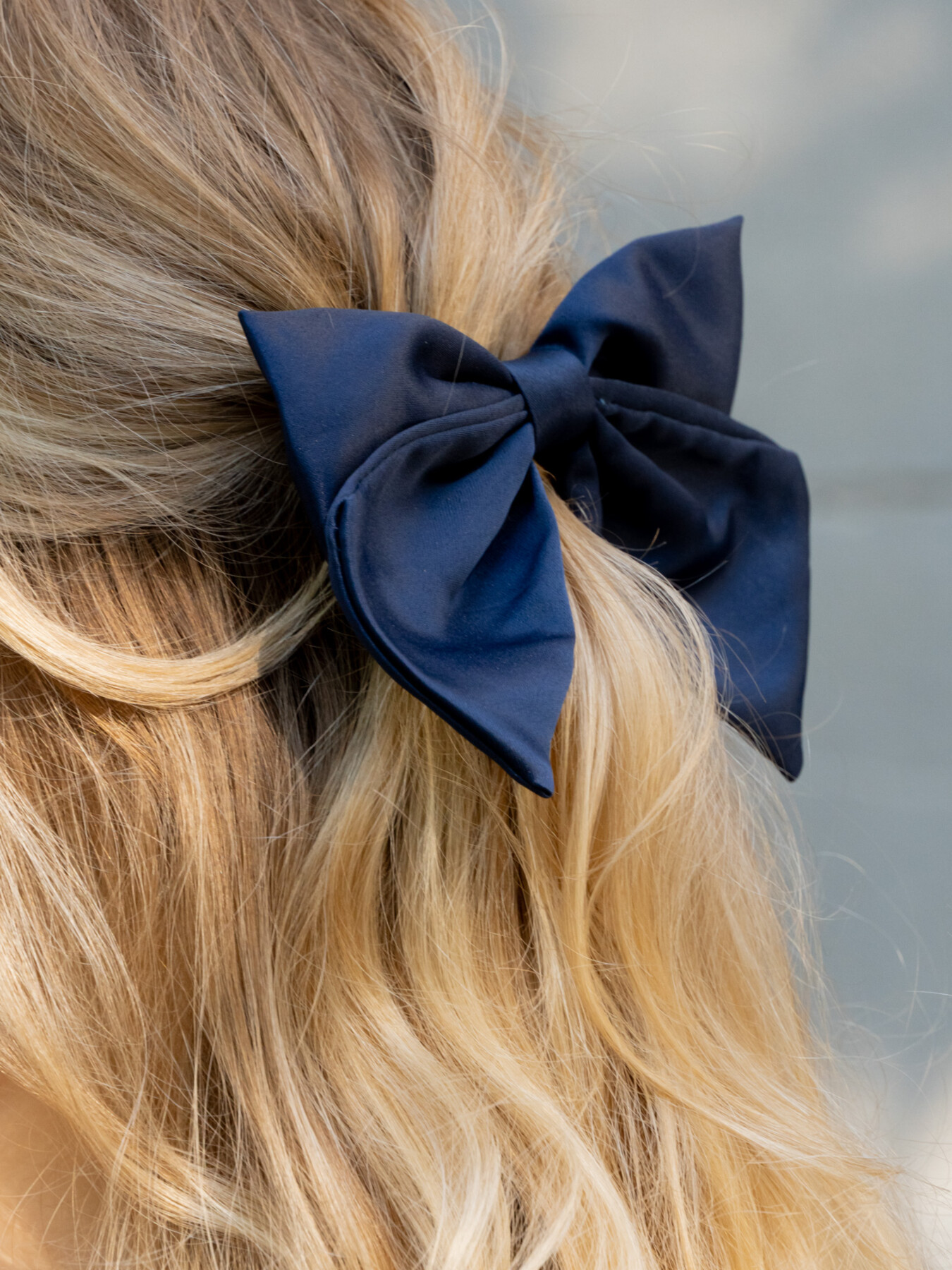 SATIN BOW HAIR CLIP NAVY BLUE