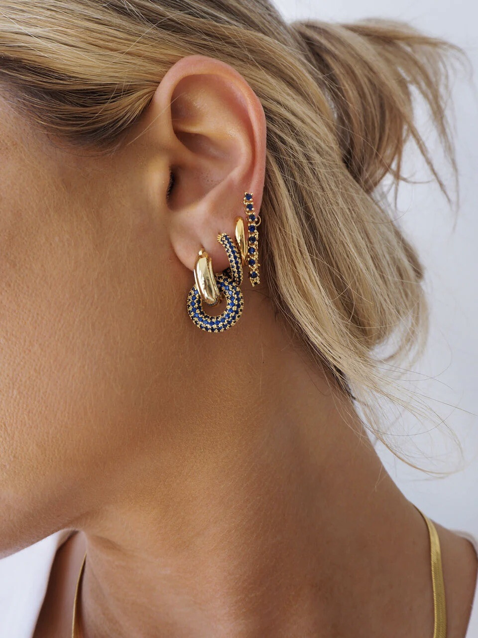 LUV AJ PAVE INTERLOCK HOOPS BLUE SAPPHIRE GOLD